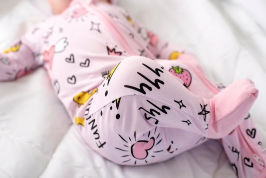 Premium bamboo baby pajamas with zipper and built-in hand covers for newborn girls – gentle organic sleepwear